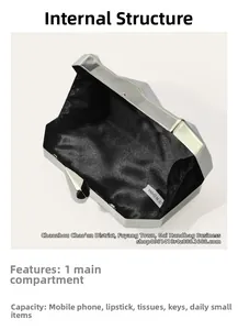Silver metallic evening clutch interior showing space for phone, lipstick, and keys