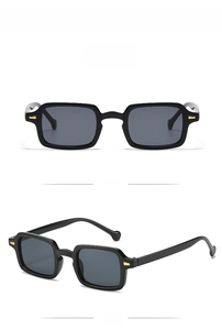 Gafas de sol negras cuadradas con remaches metálicos retro y acabado brillante