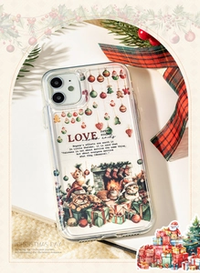 Dettaglio della cover iPhone natalizia con illustrazioni di gatti e decorazioni