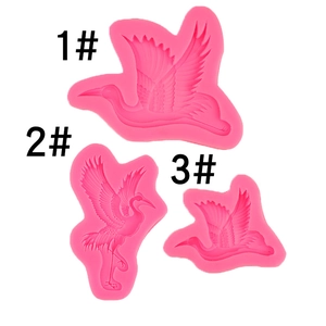 Detailed pink crane silicone molds for fondant showing delicate feather textures and wings