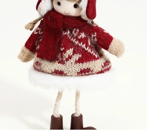 Detailed view of handmade Christmas plush angel doll with knit sweater and faux fur skirt