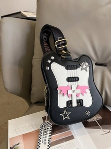 Unique guitar-shaped crossbody bag with black and white leather, wings and star studs
