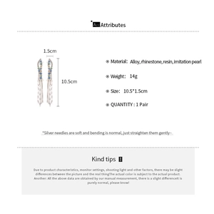 Detailed specs of silver needle butterfly earrings with pearls and long chain tassels