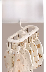Multi-clip drying rack for baby bibs with non-slip clips and oval plastic frame
