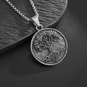 Viking Tree of Life steel pendant necklace with silver relief on a dark stone