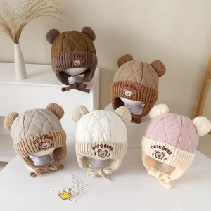 Quilted bear ear hats for kids in five colors featuring warm fleece lining and chin straps