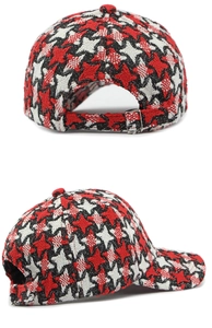 Detail of tweed houndstooth baseball cap showing adjustable metal buckle and texture