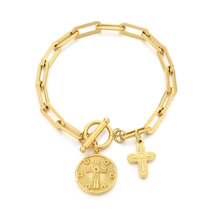 Golden paperclip chain bracelet with OT toggle clasp and cross charms in hip hop style