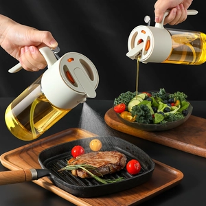Detailed view of 200ml glass oil sprayer showing dual spray and pour functions for cooking