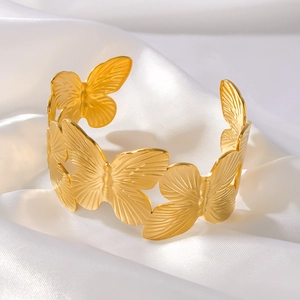 Exaggerated large hollow butterfly open bangle in 18k gold plated titanium steel