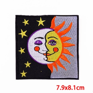 Macro shot of sun and moon embroidery patch with stars and detailed stitching, size 7.9x8.1cm