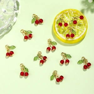 Three-dimensional red cherry charms with green leaves and gold hooks for DIY jewelry