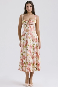 Detail of floral spaghetti strap maxi dress with waist cinching and pink flower patterns