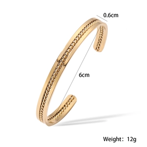 Detail view of 18K gold plated stainless steel cuff with width and weight measurements