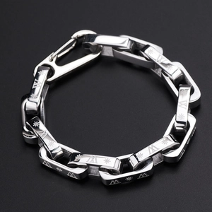 Hip hop titanium steel chain bracelet with engraved star and W patterns on a black background