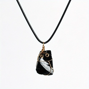 Natural black crystal stone wire wrapped pendant necklace with golden metal design