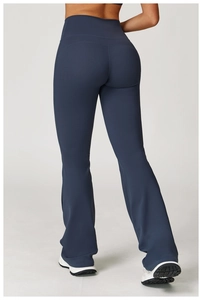 Close-up of high-waisted navy yoga flare pants showing back fit and elastic fabric