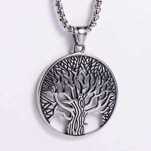 Detailed view of the silver Viking Tree of Life round pendant with classic pearl chain link