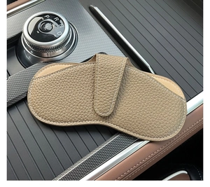 Detail view of khaki pebble leather car glasses case with premium hand-stitched seams