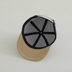 Internal view of striped hip-hop hat for kids with mesh back and adjustable buckle strap