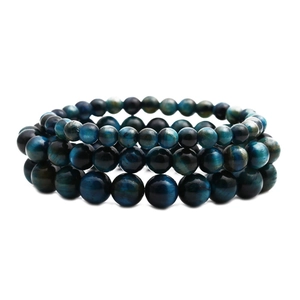 Blue tiger eye stone beaded bracelets for men in three different bead sizes on white background