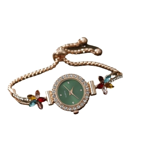 Rose gold watch with green dial, rhinestone bezel and colorful crystal floral chain