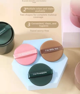 Three-color round cushion puffs in a matching portable storage case for BB cream