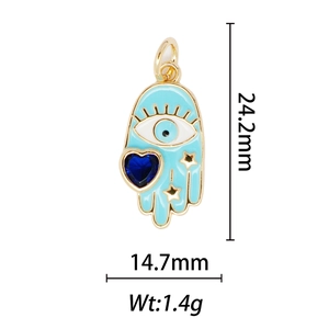 Detail of Hamsa Hand pendant with blue enamel and crystal showing size 24.2mm x 14.7mm