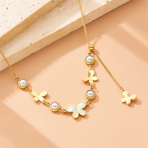 Golden stainless steel necklace with butterfly pendant and white shell inlay detail