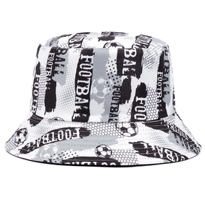 Detail of black and white bucket hat featuring repeated football lettering and motifs