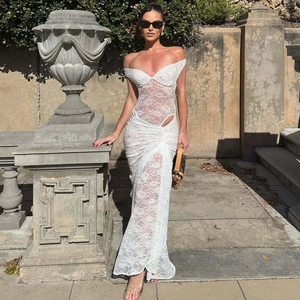 Detail of white lace off-shoulder dress with hollow waist and high side slit