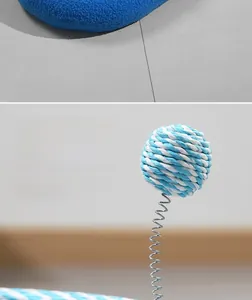 Close-up of interactive blue and white rope ball with metal spring for cat scratchers