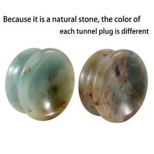 Set of two concave natural stone ear tunnel plugs with unique organic patterns and textures