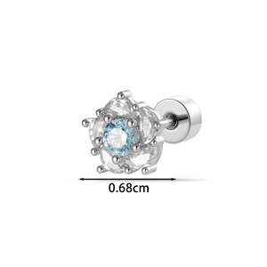 Silver camellia flower labret stud with blue center stone and clear zircon petals