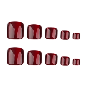Glossy wine red cat eye press-on toe nails in square shape on white background