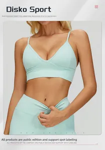 Detail of mint green ribbed seamless yoga bra and high-waisted leggings set