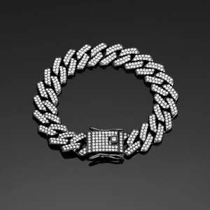 Detailed close-up of 14mm black rhodium cuban link chain with full pave diamond setting