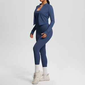 Three-piece yoga set in navy blue featuring a zip jacket, sports bra, and high-waist leggings