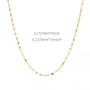 Detail of 18K gold stainless steel lip chain with 0.2x2x4mm links in white background