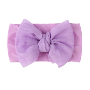 Purple nylon baby turban headband featuring a large soft chiffon bow on white background