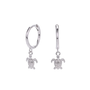Macro shot of silver turtle pendant hoop earrings on a clean white background
