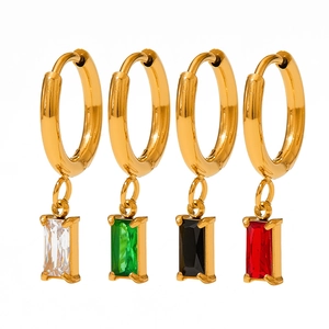 Detail of gold hoops with rectangular zircon pendants in clear, green, black, and red colors