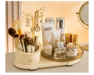 Detail view of rotating makeup organizer with golden deer antlers and amber tray