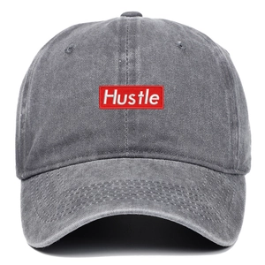 Vintage dark gray washed cotton baseball cap with red Hustle embroidered patch