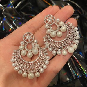 Luxurious gold-plated silver needle pearl earrings with zircons and shell fringe