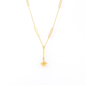 Minimalist gold starburst pendant necklace with sparkling crystal and oval link chain