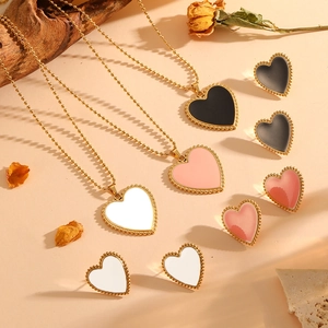 Elegant gold heart jewelry set including enamel necklaces and stud earrings in three colors