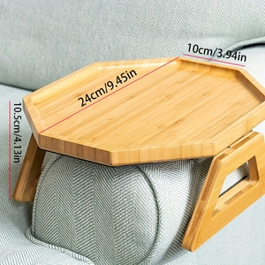 Bamboo sofa armrest tray with drink holder measurements 24cm by 10cm on a grey couch