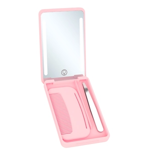 Pink portable LED makeup mirror set with storage case comb and tweezers on white background