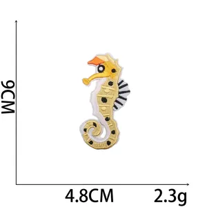 Detailed seahorse embroidery patch size 9x4.8cm with yellow black dots and 2.3g weight